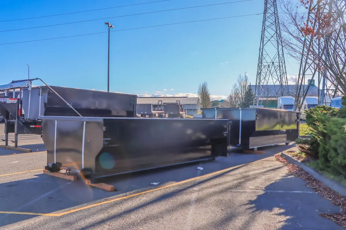 Roll-off dumpster ready for waste disposal at job site for 12 Yard Dumpster Rental in Melissa